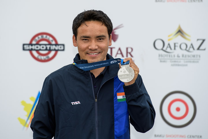 Jitu Rai displays his silver medal at the ISSF World Cup in Baku, Azerbaijan