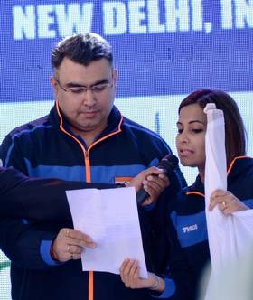 Gagan Narang and Heena Sidhu taking the oath.